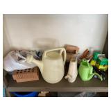 Watering cans and gardening supplies