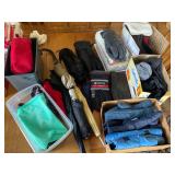 Large lot of gloves, scarves, and umbrellas