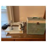 Vintage Singer sewing machine with case