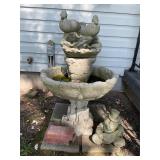 Cement bird bath and teddy bear lawn decor