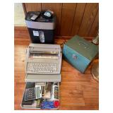 Typewriter, shredder, and office supplies
