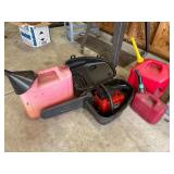 Chainsaw and gas cans
