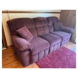 Double-reclining upholstered sofa