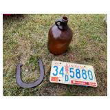 Vintage license plate, gallon jug, horse shoe