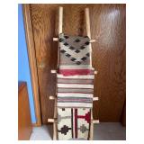 Vintage Mexican rugs with wood display