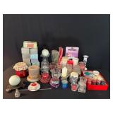 Assorted candles and candle holders