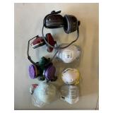 Assorted masks and ear headsets