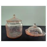 2 - pieces of pink depression glass with lids