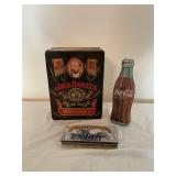 Assorted tins, tin with knife