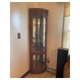 Corner curio cabinet with light