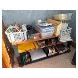 Assorted office supplies and stand
