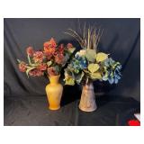 Vases with artificial flowers