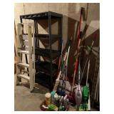Assorted cleaning supplies and shelving unit