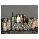 Large lot of antique bottles and jars
