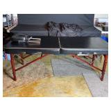 Folding massage table