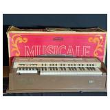 Antique electric chord organ