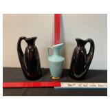 Black Pottery pitchers, small aqua pitcher