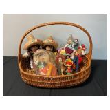 Assorted Dolls in a basket