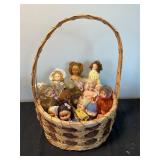 Dolls in a basket