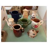 Assorted tea pots, water pitcher