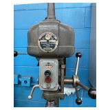 Drill press with stand