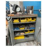 Cabinet with milling cutters