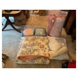 Assorted pillows and blankets