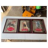 Assorted Coca-Cola mirror pictures