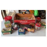 Assorted Coca-Cola tins and wagon