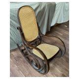 Cane back rocking chair