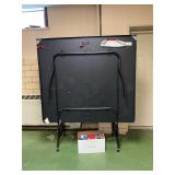 Ping pong table with supplies