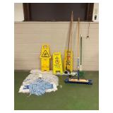 Broom, mom heads, signs