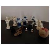 Wooden carved shoes, Angel statues, dog, etc.