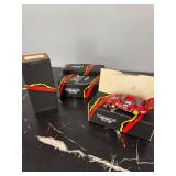 4 Porsche die cast cars.