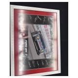Framed posters with signatures