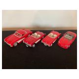 4 red race cars 3 Vettes, 1 Viper