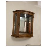 Rounded curio cabinet