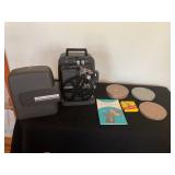 Projector and reels