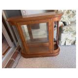 Curio cabinet with missing side glass