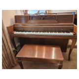Wurlitzer upright piano with bench