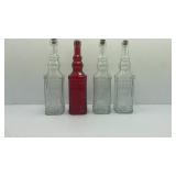 Four Decorative Cork Bottles Three Clear Glass