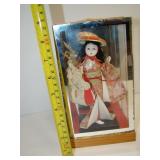 Oriental Figurine in Display Case