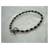 Black Glass Bead and Gold Bracelet
