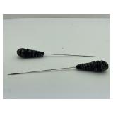 Pair of hat pins?