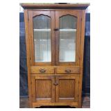 Vintage oak cabinet pie safe featuring glass