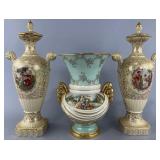 3 vintage porcelain vases depicting figures in