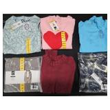 Women's size dress, sweaters, and shirts. Most