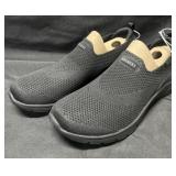 Ladies Skechers black slip on, size 8