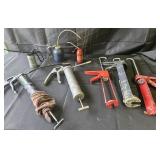 Caulking tools, grease guns and oil cans