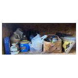 Contents of garage shelf: sump pump, yard